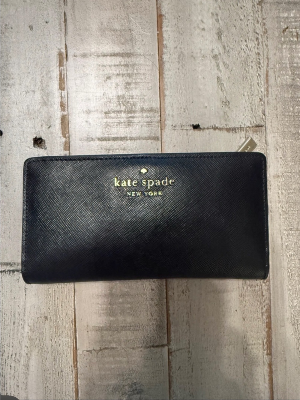 kate spade black saffiano continental zip wallet with gold logo